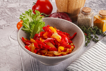 Diced raw bell red and yellow pepper