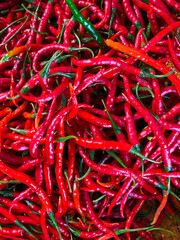 Piles of hot red chilies at a traditional market in Indonesia