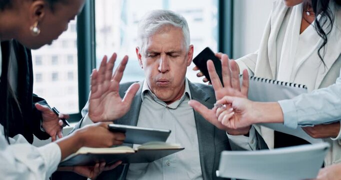 Busy, meeting and overwhelmed man with team workload, paperwork or phone call at digital agency. Stress, business people and mature consultant in office with anxiety, burnout or management crisis