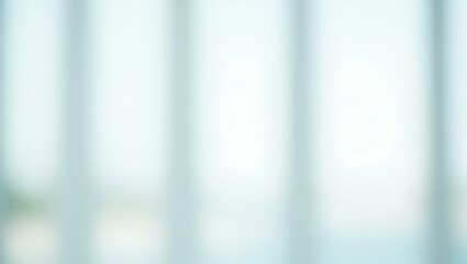 Fototapeta premium Blurred background of minimalist glass wall interior with city. Window view