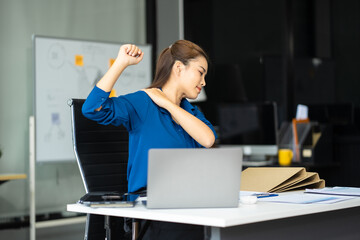 Businesswoman overworked with fatigue.