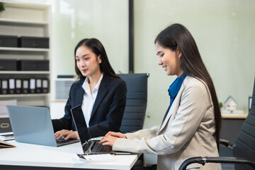 Fototapeta premium Business team meeting present.professional investor working with new startup project. Finance managers task.Digital tablet laptop computer design smart phone in morning light.