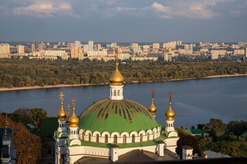 Golden Domes of Kyiv Pechersk Lavra with the Dnipro River and Cityscape in the Background