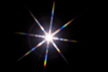 colorful flashy spotlight star made with optical star filter on camera