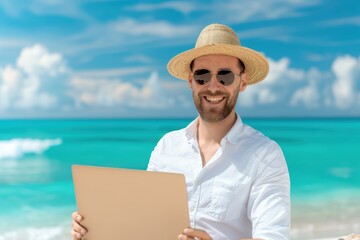 A cheerful man in a straw hat and sunglasses holds a blank sheet of paper at a sunny beach, with turquoise waters and clouds in the background.