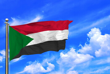 Sudan National Flag Waving Proudly Against a Bright Sky