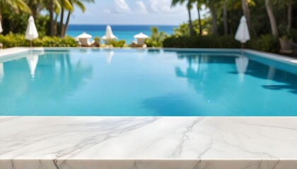 A clear view of a swimming pool with a clear blue water surface in the background. The foreground features a marble countertop. In the distance, there are white umbrellas and palm trees , suggesting a