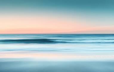 Obraz premium Closeup of sandy beach with a gently blurred ocean background, evoking a sense of calm and relaxation by the sea