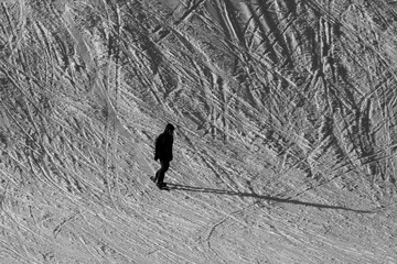 a snowboarder coming down the slope