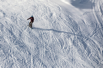 a snowboarder coming down the slope