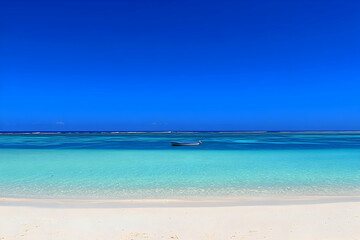 Naklejka premium A serene beach scene with clear turquoise waters and a small boat under a blue sky.