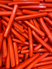 frozen beef sausages in freezer as food background