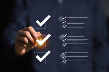 Quality check, Businessman makes a checklist Assessment and questionnaire, businessman using...