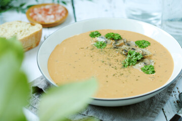A bowl with mushroom cream soup