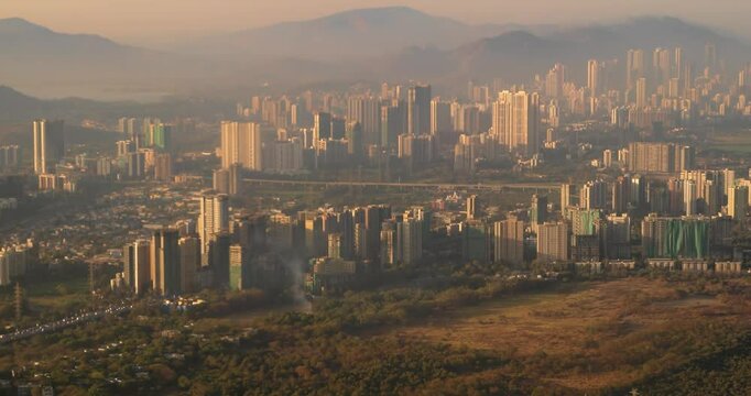 Barve Nagar, Ghatkopar West, Mumbai, Maharashtra, India. Mumbai Metropolitan Region. Aerial View From Airplane Window On View of the Mumbai suburb district. Evening morning sunset sunrise light