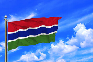 Elegant Flag of The Gambia Waving Beneath a Vibrant Sky