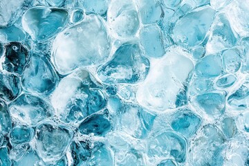 A close-up view of clear ice cubes with varying shapes and textures.