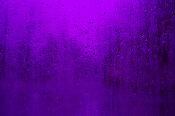 wet lilac glass. condensation on the glass