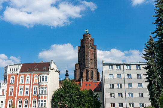 Tower of Church of All Saints (kości&oacute;ł Wszystkich Świętych) rises above the city. Gliwice, Poland.