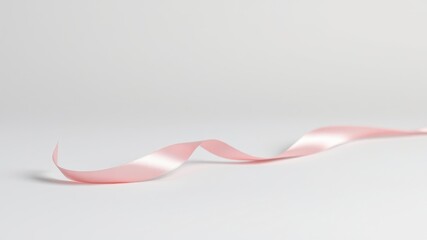 Naklejka premium A Gentle Curve of Pale Pink Satin Ribbon on a White Background