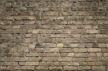 brick wall made of old brown bricks close up