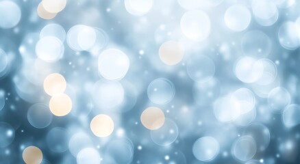 Abstract blue bokeh background with light spots.