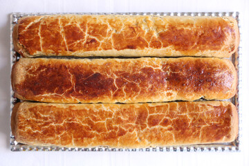 Composition of homemade walnut and poppy seed rolls aka beigli in Hungary. Traditional hungarian christmas or easter cake bejgli at christmastime. Freshly baked sweet filled strudel cakes