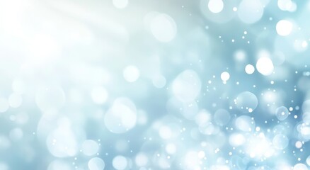 Abstract light blue bokeh background with glowing circles and sparkles.