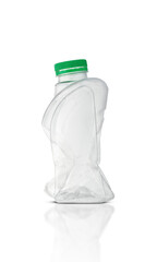 crushed plastic bottle of washing liquid