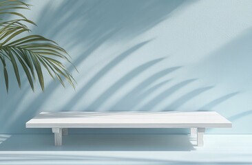 Minimalist white shelf against light blue wall with palm leaf shadow.