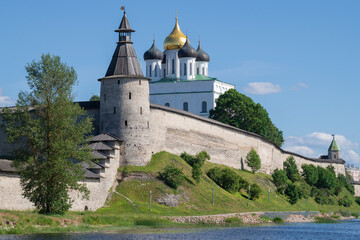Fototapeta premium Kutekroma Tower and Trinity Cathedral in Pskov Kremlin on a sunny June day. Pskov, Russia