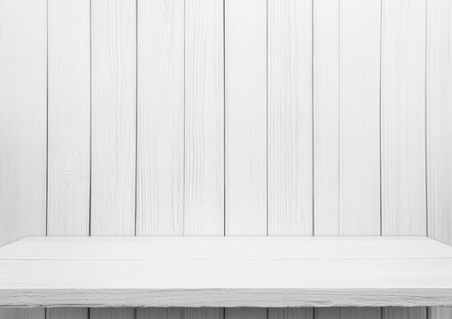 White wooden shelf against a white wood panel wall.