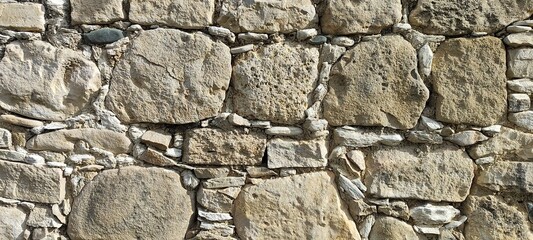 Stone wall photo, textured background.