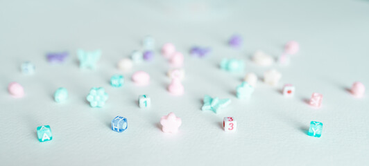 Beads set for children hobby. Kids beads to create jewelry with copy space.