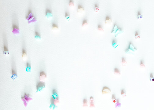 Beads set for children hobby. Kids beads to create jewelry with copy space.