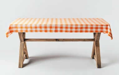 Orange gingham tablecloth on rustic wooden table. (1)