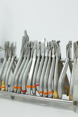 Medical instruments in the dental clinic. The background of a dentistry.