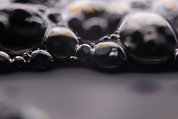 Grey bubbles in the darkness, gloomy abstract, gray reflections, fluid abstraction, creepy...
