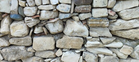 Stone wall photo, textured background.