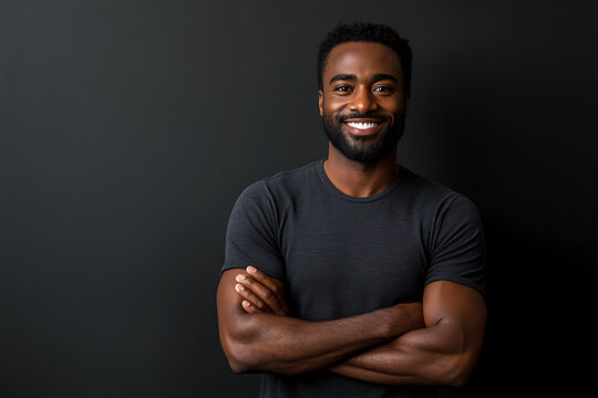 Portrait of a Smiling Black Man Against a Dark Background Studio Shot, a Happy and Confident Male Model