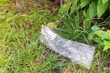 Crumpled Plastic Wrap on Grass