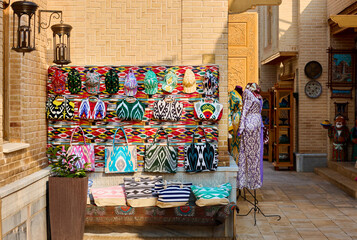 Ethnic bags and hat at market in Uzbekistan