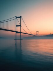 Bosphorus Strait at sunrise, with the Istanbul Bridge casting a long shadow across the water.