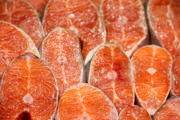 Red salmon steaks in a store. Cooled fish with omega fats