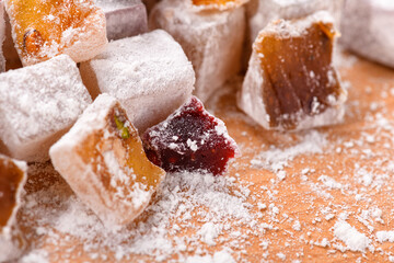Sweet food Turkish delight, assorted rahat locum in form of cubes with nuts and powdered sugar, traditional food