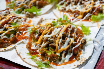 Delicious kebabs consist of cut up meat with vegetables and various other accompaniments according to the specific recipe.