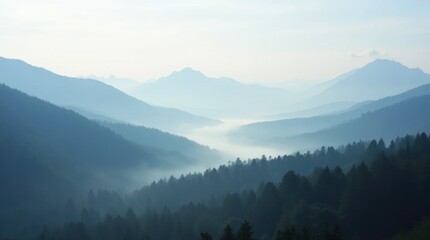 Obraz premium Fog-Covered Valley with Mountain Peaks