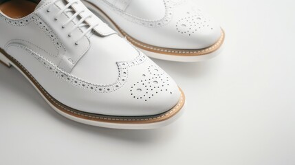 Fototapeta premium A classic pair of men's shoes on white, with a clean and polished design for everyday use,