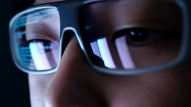 Close-Up Footage of Eyes Focused on Computer Code