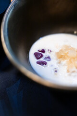 Thai glutinous rice balls with coconut milk.